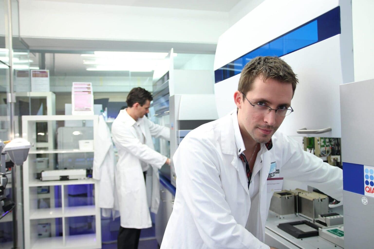 a man in white lab coats